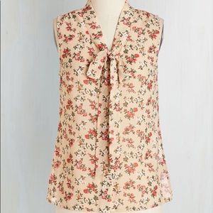 Tan blouse with red and cream floral print